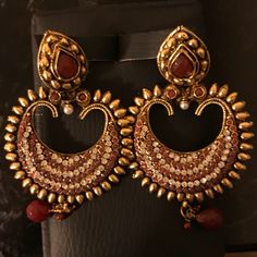 Indian Gold Earrings With Red Silver Stones New Without Tags . About 3.5 Inches Long Red Round Metal Earrings, Red Dangle Jewelry For Festivities, Red Dangle Jewelry For Festive Occasions, Red Pierced Earrings For Wedding, Red Pierced Wedding Earrings, Red Pearl Drop Earrings For Festive Occasions, Festive Red Pearl Drop Earrings, Elegant Red Festive Danglers, Traditional Red Hoop Earrings As Gift