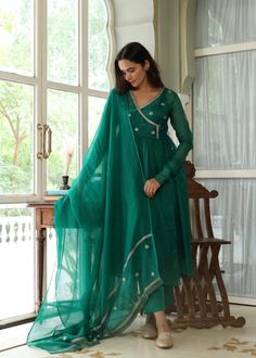 Hand embroidered bottle green Anarkali with matching pants and dupatta / anarkali suit set / anarkali dupatta USA /green suit set / Indian dresses/ voggish / pure silk pink wrap anarkali dress with pant/ kurta set women          Looking for a perfect indian dress/anarkali/suit sets that are trendy, unique and easy to carry !! yess, You are at the right place. we carry such versatile pieces of anarkalis and suit sets that really let you stand out in any occassion !!      featuring this beautiful Neon Green Anarkali, Green Short Kurti Outfit, Bottle Green Anarkali Dresses, Wrap Anarkali Dress, Footwear For Traditional Outfit, Neck Design For Anarkali, Green Kurta Set Women, Traditional One Piece Dress Indian, Green Kurta Woman