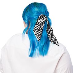 a woman with blue hair wearing a bandana