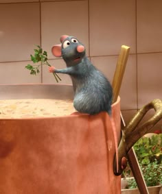 a cartoon mouse in a pot with some plants on the top and one hand reaching out to grab something