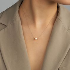 "Delicately dainty and elegant, this 14k gold solitaire pearl necklace is simple, yet sophisticated. A classic pearl floating on the 14k real gold chain will be your favorite piece of jewelry to wear every day.  F E A T U R E S    * Gold Carat: 14K  * Choice of Gold Color: Yellow Gold, Rose Gold, White Gold  * Pendant Diameter: 7,50 mm /  0.30 in * Length Options: 14\", 16\", 18\", 20\"   * Ready to Ship in 1-3 Business Days  * 1-Year Warranty  * Free Shipping  * Free returns within 30 days from Gold Schmuck, Real Gold Chains, Gold Jewelry Gift, Floating Necklace, White Gold Chains, Pearl Pendant Necklace, Cross Jewelry, Evil Eye Jewelry, Lovely Jewellery