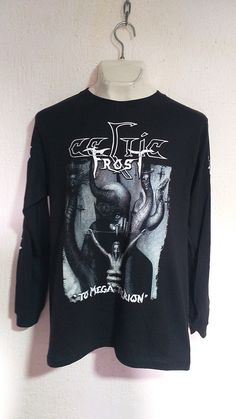 CELTIC FROST MEGA THERION LONG SLEEVE SHIRT New Celtic Frost Long Sleeve Shirt High Quality We'll shipping worldwide. Shipping time range. United States = 20-25 business days Rest of the world = 25-30 business days Long Sleeve Punk Shirt For Alternative Fashion, Punk Long Sleeve Shirt For Alternative Fashion, Gothic Long Sleeve Shirt For Halloween, Gothic Long Sleeve Cotton T-shirt, Long Sleeve Halloween Concert T-shirt, Long Sleeve Halloween T-shirt For Alternative Fashion, Alternative Long Sleeve T-shirt For Concerts, Gothic Long Sleeve Cotton Shirt, Black Long Sleeve Alternative Shirt