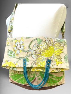 Introducing our versatile canvas crossbody messenger bag with fold-over flap, where functionality meets style in every detail. Crafted with care and attention to detail, this bag offers multiple carrying options and thoughtful design elements. The exterior features a beautiful green and yellow flower pattern canvas on the top, creating a vibrant and eye-catching aesthetic. Carry it effortlessly by the leather handles for a classic look, or attach the adjustable matching shoulder strap for hands- Multicolor Canvas Satchel With Double Handle, Rectangular Tapestry Satchel With Detachable Handle, Multicolor Rectangular Canvas Satchel, Brown Tapestry Satchel With Double Handle, On-the-go Canvas Bag With Zipper Pocket And Double Handle, Coffee Bean Bags, Striped Upholstery Fabric, Striped Upholstery, Canvas Messenger Bag