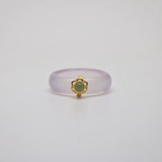 A small round green jade charm dotted on genuine white jade band. 18k gold plated sterling silver carved base and little green jade invest the white band with vintage feeling. Genuine white jade band 3mm thickness 5mm width Size US7 Jade Engagement Ring, Jade Wedding, Vintage Feeling, Reference Board, Jade Charm, Dainty Rings, Tiny Rings, Gold Jewelry Simple, Jade Ring