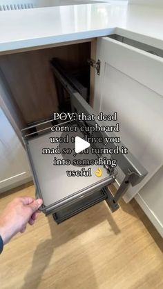 someone is opening the door to their kitchen cabinet with an ad on it that reads, pov that dead corner cupboard used to give you mad so turned it into something interesting