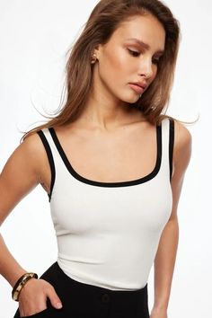 Tayla Scoop Neck Tank Top  Snow White & Black White Ribbed Scoop Neck Tank Top, White Stretch Scoop Neck Tank Top, Chic Scoop Neck Seamless Tank Top, White Ribbed Sleeveless Camisole, White Stretch Tank Top With Wide Straps, Stretch Crop Top With Contrast Color, White Scoop Neck Seamless Camisole, White Seamless Camisole With Scoop Neck, White Sleeveless Color Block Tank Top