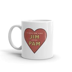 a white coffee mug with the words i love you more than jam on it