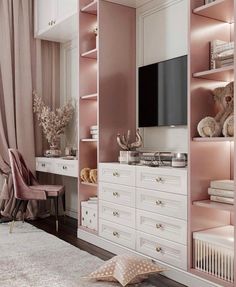 a bedroom with pink walls and white furniture