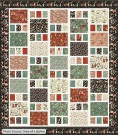 a quilt made with squares and flowers