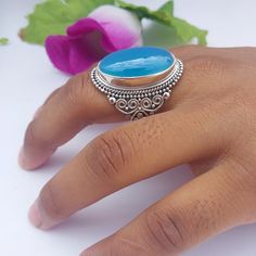 INTRODUCE OUR NEW JEWELRY PRODUCT  " 925 BLOE ONYX STATEMANT SILVER RING "  MADE BY RADHE SHYAMA JEWELLERS. ::ITEM DETAILS:: MATERIAL:-  SILVER (92.5) GEMSTONE:-BLUE ONYX STONE SIZE :- FREE SIZE FINISH:-  OXIDIZED WITH HEND POLISHED, SILVER POLISHED  WEIGHT:--    12gm - 16gm APPROX  ---------------------- :: OTHER INFORMATION ::   THIS IS A HANDMADE PRODUCT, WHICH IS MADE BY LOVE AND CARE.  ALL ITEMS ARE BEAUTIFULLY AND PARFECTLY PACKAGED IN JEWELRY BOXES. IF YOU WANT ANY  FURTHER INFORMATION AB Oval Turquoise Ring With Polished Finish As Gift, Oval Hallmarked Rings As Gift, Oval Hallmarked Rings For Gift, Silver Turquoise Ring As A Gift, Hallmarked Turquoise Ring As Gift, Handmade Oval Topaz Ring For Gift, Unique Oval Rings As Gift, Unique Oval Ring For Gift, Oval Turquoise Ring Hallmarked For Gift