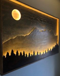 a painting hanging on the wall above a bed