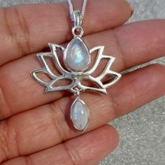 💖  Product Description 925 Sterling Silver Lotus Flower Pendant set with Cabochon Moonstones Matching earrings also available - https://www.etsy.com/uk/listing/696435957/rainbow-moonstone-lotus-flower-925 Moonstone is the June Birthstone We recommend our 1.2mm Snake chains for this pendant, which you can select at checkout in various lengths, or just have the pendant on its own.  (Prices with a chain includes the pendant and chain price) If you prefer a different style of chain, we have other c Lotus Flower Pendant, June Birthday, Muddy Waters, Sterling Silver Jewellery, Wedding Bridal Jewellery, June Birthstone, Bridal Jewellery, June Birth Stone, Moon Stone