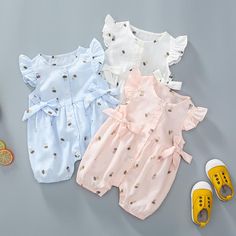 Casual Fitted Bubble Romper With Short Sleeves, Fitted Short Sleeve Casual Bubble Romper, Casual Fitted Short Sleeve Bubble Romper, Summer Cotton Short Sleeve Bodysuit, Summer Short Sleeve Cotton Bodysuit, Cute Short Sleeve Onesie For Summer, Cute Short Sleeve Summer Jumpsuits And Rompers, Cute Short Sleeve Summer Bodysuit, Cotton Bubble Romper With Buttons For Spring