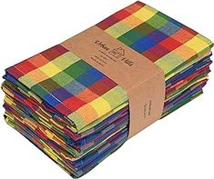 a stack of multicolored cloths sitting on top of each other