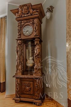 an old grandfather clock sitting in the corner of a room