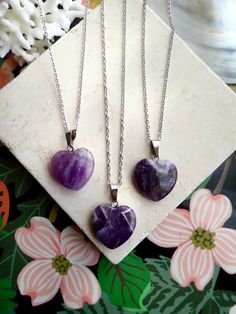 This polished genuine amethyst heart pendant hangs from your choice of chain.The February birthstone, amethyst, is said to strengthen relationships and give its wearer courage. At one time, only royalty could wear the gem. Ancient Greeks thought that the amethyst guarded against intoxication. In fact, “amethyst” comes from amethystos, a Greek word meaning “sober.”Amethysts are the birthstone for February and also traditionally given on the 6th wedding anniversary.- 18" Rhodium Plated Chain. ‚Ä¢ Amethyst Heart Pendant Jewelry For Anniversary, Heart Cut Amethyst Birthstone Jewelry, Amethyst Heart Cut Necklace For Anniversary, Heart Cut Amethyst Necklaces For Anniversary, Heart Cut Amethyst Necklace For Anniversary, Anniversary Amethyst Heart Necklace, Amethyst Birthstone Heart Pendant Jewelry, Amethyst Gemstone Jewelry For Valentine's Day, Heart-shaped Amethyst For Jewelry Making