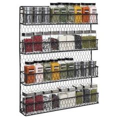 the wire shelving is holding many containers