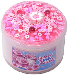 a pink and white container with flowers on it