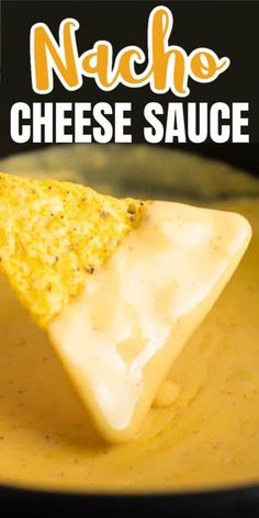 a piece of cheese sauce is being held up