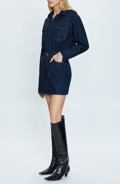 Tap into the all-denim trend in this nonstretch mini shirtdress flaunting a dark wash and contrast topstitching. 34" length (size Small) Front snap closure Spread collar Long sleeves with button cuffs Five-pocket style 100% cotton Machine wash, tumble dry Imported Denim Blue Mini Denim Top, Dark Wash Mini Dress With Pockets, Fall Mini Length Denim Dress, Fall Mini Denim Dress, Relaxed Fit Mini Denim Dress For Work, Medium Wash Denim Mini Dress For Work, Dark Wash Denim Dress With Pockets In Mini Length, Chic Long Sleeve Dark Wash Denim Dress, Dark Wash Denim Mini Dress With Pockets