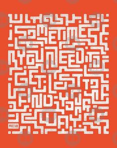 an orange and white square with some type of text in the center that is shaped like a maze