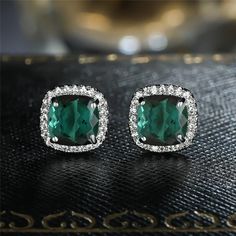 The gemstone enhances their sentimental relationship as well as produces common confidence and trust among them. It is the gemstone of enduring connections, which are upgraded by reliability and earnestness. Also, it is prescribed for those couples who are encountering any sorts of issues in their relationship. Gemstone- Green Teal Sapphire Shape-Size- Cushion 6.0MM  Metal- 925 Sterling Silver, Solid 14K Gold also available  Finish Type- Choose From Above ( Gold Item Selection need 8 to 10 days in Development ) customisation (like colour choices) included in the listing, the photos shown are just reference. Diamond Earrings For May Birthstone Gift, Gift Green Diamond Earrings, Green Gemstone Diamond Earrings As Gift, Green Gemstone Diamond Earrings For Gift, Green Diamond Earrings For Gifts, Green Diamond Earrings As Gift, Fine Jewelry Green Diamond Earrings For Gift, Fine Jewelry Green Diamond Earrings As Gift, Diamond Earrings With Halo Setting For Gift