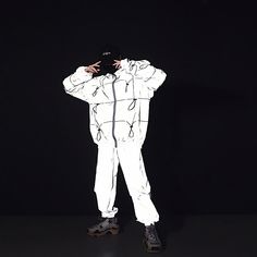 Our Reflective Techwear Jacket is low-key until you don't want it to be. The Techwear Jacket is in a smooth grey, but when it reflects any kind of light, it comes to life in a bright color mix between silver and white. It looks like it is from another dimension. Perfect for your next Festival, Rave, or Night Out Fitted Sporty White Track Jacket With Reflective Details, White Windbreaker For Winter Streetwear, White Techwear Outerwear For Streetwear, White Techwear Track Jacket For Winter, Winter Outerwear With Reflective Logo And Long Sleeves, Reflective Long Sleeve Winter Windbreaker, White Sporty Windbreaker With Reflective Details, White Techwear Windbreaker For Spring, White Reflective Long Sleeve Windbreaker