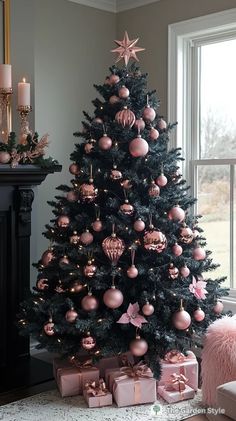 a christmas tree with pink and gold ornaments