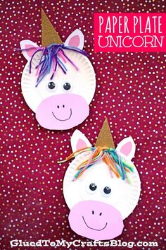 two paper plates with unicorn faces on them