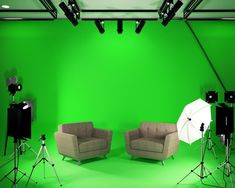 green screen studio with two chairs and one chair in front of the camera set up