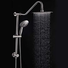 an open shower head with the rain running down it's side and handset