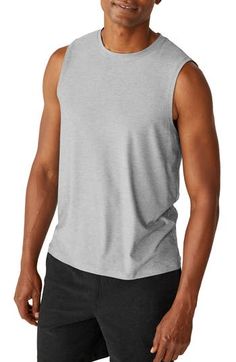 Radiate zen from the inside out with this supersoft tank featuring a stretchy knit and athletic fit. 28" length (size Medium) Crewneck Moisture-wicking fabric engineered for dryness and comfort 94% polyester, 6% elastane Machine wash, tumble dry Made in the USA of imported materials Men Yoga Outfit, 4-way Stretch Sleeveless Activewear For Light Exercise, Basic Moisture-wicking Tank Top For Gym, Athleisure Tank Top For Yoga With Relaxed Fit, Athleisure Relaxed Fit Tank Top For Yoga, Relaxed Fit Tank Top For Yoga In Athleisure Style, Relaxed Fit Athleisure Tank Top For Yoga, Versatile Sleeveless Muscle Tee For Workout, Fitted Moisture-wicking Muscle Tank Tee