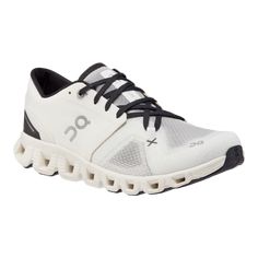 the on cloud running shoe is white and black