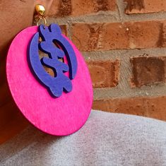 Large And Chunky Style Handmade Originals Bright And Eye Catching Colors Natural Wood 100%Handmade Only 1 Available Extra Large Size These Hang 5 Inches These Are Very Lightweight On The Ear Gold Clip On Closure Easy To Wear They Are One Of A Kind These Earrings Are A Classic And Timeless Addition To Any Afrocentric Wardrobe Purple Handmade Small Hoop Earrings, Handmade Small Purple Hoop Earrings, Trendy Purple Hoop Earrings, Handmade Purple Hoop Earrings, Afro Pick, Clip On Hoop Earrings, Gye Nyame, Adinkra Symbols, Wooden Hoop