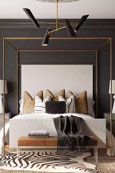 a bedroom with black walls and white bedding, zebra rugs on the floor