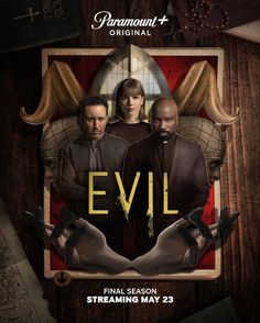 an evil movie poster with two men in the middle and another man standing behind them