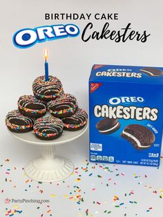 a birthday cake and box of oreo cakes