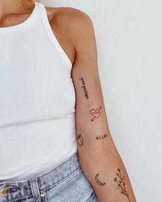 a woman with a small tattoo on her arm