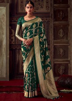 Embrace the glamor of the occasion in this sophisticated green georgette and banarasi silk designer sari. The seems stylish and ideal for any event. includes a blouse that matches. Occasion: Wedding Wear, Party Wear, Festive Wear, Engagement Wear, Mehendi Wear, Casual Wear, Diwali SAREE DETAILS :- FABRIC : Georgette Silk WORK : Banarasi LENGTH : 5.5 meter COLOR : Bottle Green  BLOUSE DETAILS :- FABRIC : Georgette Silk WORK : Banarasi SIZE : 0.80 meter (up to 44 bust size) COLOR: Bottle Green STI Bottle Green Blouse, Bottle Green Saree, Crepe Saree, Ghagra Choli, Green Saree, Trendy Sarees, Latest Sarees, Contrast Blouse, Indian Sari