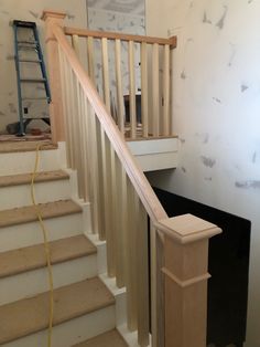 a stair case is being installed on the wall