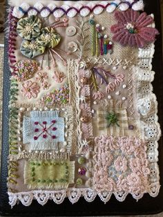 a close up of a piece of cloth with many different things on it