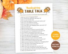 a thanksgiving table talk game with pumpkins and leaves on the table next to it