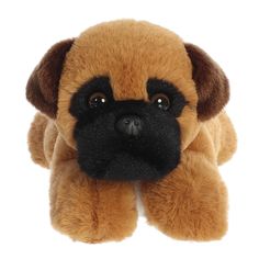 a brown stuffed dog with black eyes and nose is hanging on a white wall in front of the camera