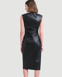 A sleek and modernized take on the LBD — this vegan leather dress is perfect for the office layered over a long-sleeve tee or on its own for date night. See below for our general Size Guide and available measurements Made of polyester, lining made of polyester Machine wash cold separately, tumble dry at low temperature, cool iron as needed Spring Leather Dress For Work, Leather Midi Dress For Work, Sleek Office Dresses For Fall, Sleek Spring Midi Dress For Workwear, Sleek Structured Midi Dress For Office, Elegant Faux Leather Dress For The Office, Elegant Leather Midi Dress For Spring, Elegant Leather Midi Dress For Fall, Elegant Leather Midi Dress For Date Night