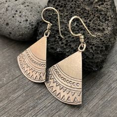 Simple yet beautiful silver triangular earrings, with small hand stamped details. Perfect earrings for any occasion, easy to match to any outfit. This are flat and light weight what makes them easy to wear. A pair to wear and never take off. They are 3.4cm- 1.45inch long 3.3cm- 1.30inch wide. They have a drop length of 5cm- 2 inch A unique addition to your jewelry collection. To see more unique silver earrings, click the link below https://www.etsy.com/shop/AkashiJewelry?ref=seller-platform-mcna Sterling Silver Triangle Earrings For Pierced Ears, Nickel-free Triangle Sterling Silver Jewelry, Bohemian Triangle Nickel-free Earrings, Nickel Free Triangle Sterling Silver Earrings, Nickel-free Triangle Sterling Silver Earrings, Sterling Silver Triangle Jewelry With Matching Earrings, Nickel-free Triangle Earrings As Gift, Nickel-free Triangle Bohemian Jewelry, Nickel-free Bohemian Triangle Jewelry