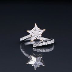 Yates Reach for the stars with this beauty! This gorgeous piece is crafted from rich 14k yellow and white gold. The incredible diamond are precisly cut to fit perfectly with one another. The diamond covered band wraps around your finger with ease. Say hello to your new statement piece! Star Diamond Ring Engagement, Star Shaped Wedding Rings, Star Shaped Ring, Star Rings Jewelry, Diamond Star Ring, Star Shaped Engagement Ring, Star-shaped Diamond Anniversary Ring, Diamond White Star-shaped Diamond Ring, Star-shaped Diamond Rings In White