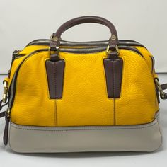 This Is A Large Oryany Crossbody Bag, Which Is Brand New. The Bag Measures 15 Inches Wide, By 11.5 Inches Tall. The Body Is All Pebble Leather, With Gold Tone Hardware. The Main Body Color Is A Beautiful Yellow, With A Taupe Bottom, And Dark Brown Leather Around The Zippers And Zipper Pulls. There Are 3 Large Zippered Compartments To The Main Bag, With Smaller Side Compartments Inside Of The Center Compartment. It Is Much Nicer Than A Tote Bag, And Will Hold Almost As Much! Luxury Yellow Crossbody Satchel, Designer Yellow Satchel With Removable Pouch, Designer Yellow Satchel With Handles, Designer Yellow Satchel With Double Handle, Designer Yellow Satchel With Detachable Strap, Luxury Yellow Crossbody Bag, Luxury Yellow Satchel Shoulder Bag, Designer Yellow Satchel For Travel, Modern Yellow Top Handle Satchel