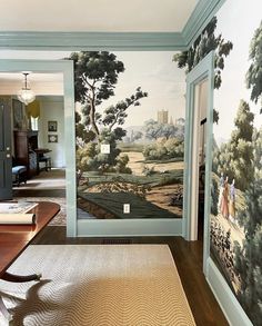 a room with a painting on the wall