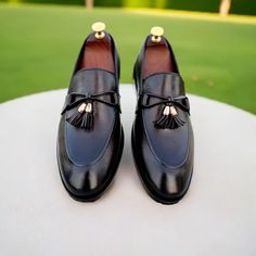 Black Slip-on Tassel Loafers for Men's Fashion Shoes
Black slip-on tassel loafers crafted with premium quality genuine leather. We use high-quality materials, including premium full-grain genuine leather, which ensures durability, comfort, and an elegant appearance. We are specialized in highly customized handmade leather shoes for men. Our shoes are crafted by skilled artisans who meticulously create each pair by hand, paying attention to detail and using traditional craftsmanship techniques.
These shoes are often considered a mark of quality and luxury, as the process involves a higher level of skill and care compared to mass-produced shoes. Handmade leather shoes offer unparalleled craftsmanship, ensuring exceptional quality and durability. Ultimately, choosing handmade leather shoes Business Tassel Loafers With Plain Toe, Business Slip-on Oxfords With Tassels, Tasseled Round Toe Dress Shoes For Galas, Tasseled Dress Shoes For Galas, Formal Loafers With Tassels And Closed Toe, Business Slip-on Loafers With Tassels, Tassel Loafers With Round Toe For Galas, Formal Tasseled Closed Toe Loafers, Formal Tasseled Closed-toe Loafers