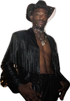 a man wearing a black hat and jacket with fringes on his chest, standing in front of a white background